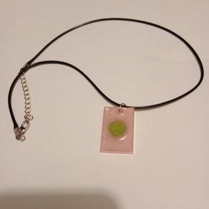 Brand new fashion necklace with 18 inch black rope with chain.